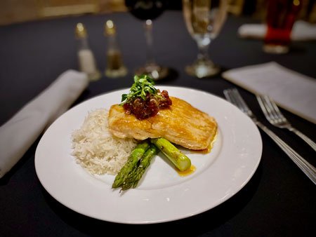 Seared salmon with tomato chutney and asparagus