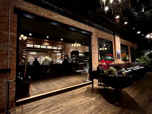 View of the bar and piano area
